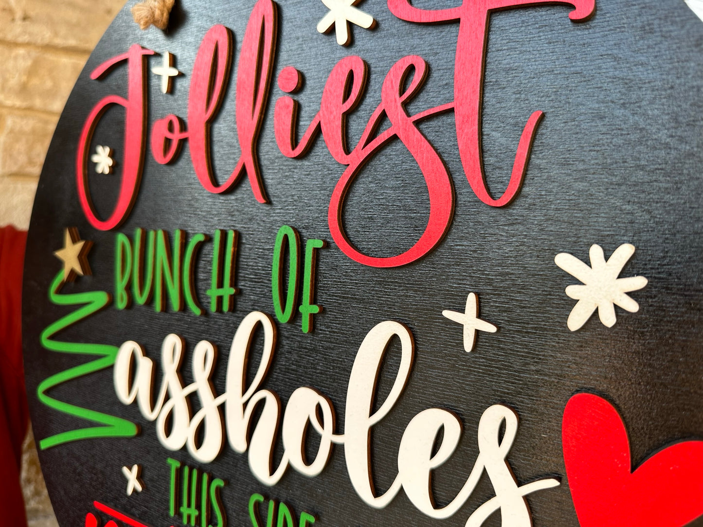 Jolliest Bunch of Assholes Sign